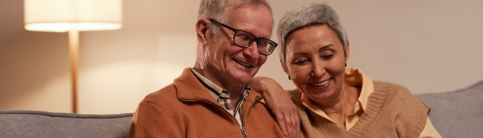 senior couple on their computer